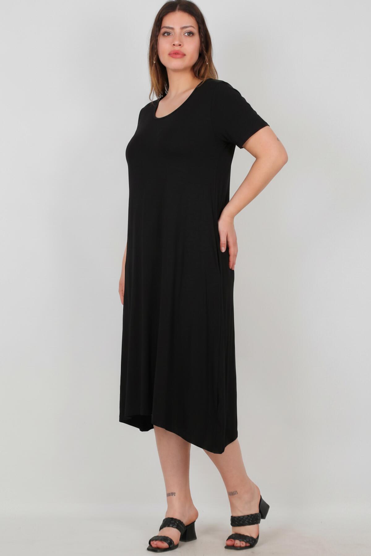Oversized-Kleid mit Seitentaschen — Schwarz