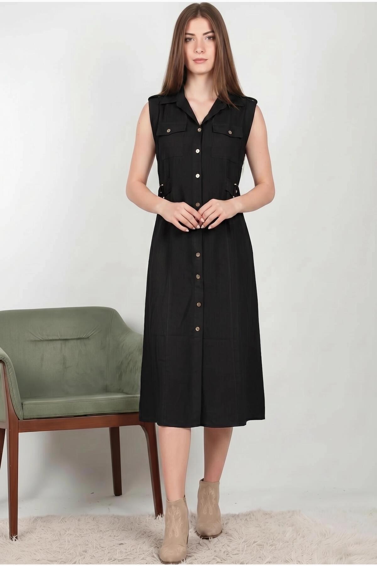Schwarzes Hemdblusenkleid mit Pattentaschen und glänzenden Knöpfen vorne