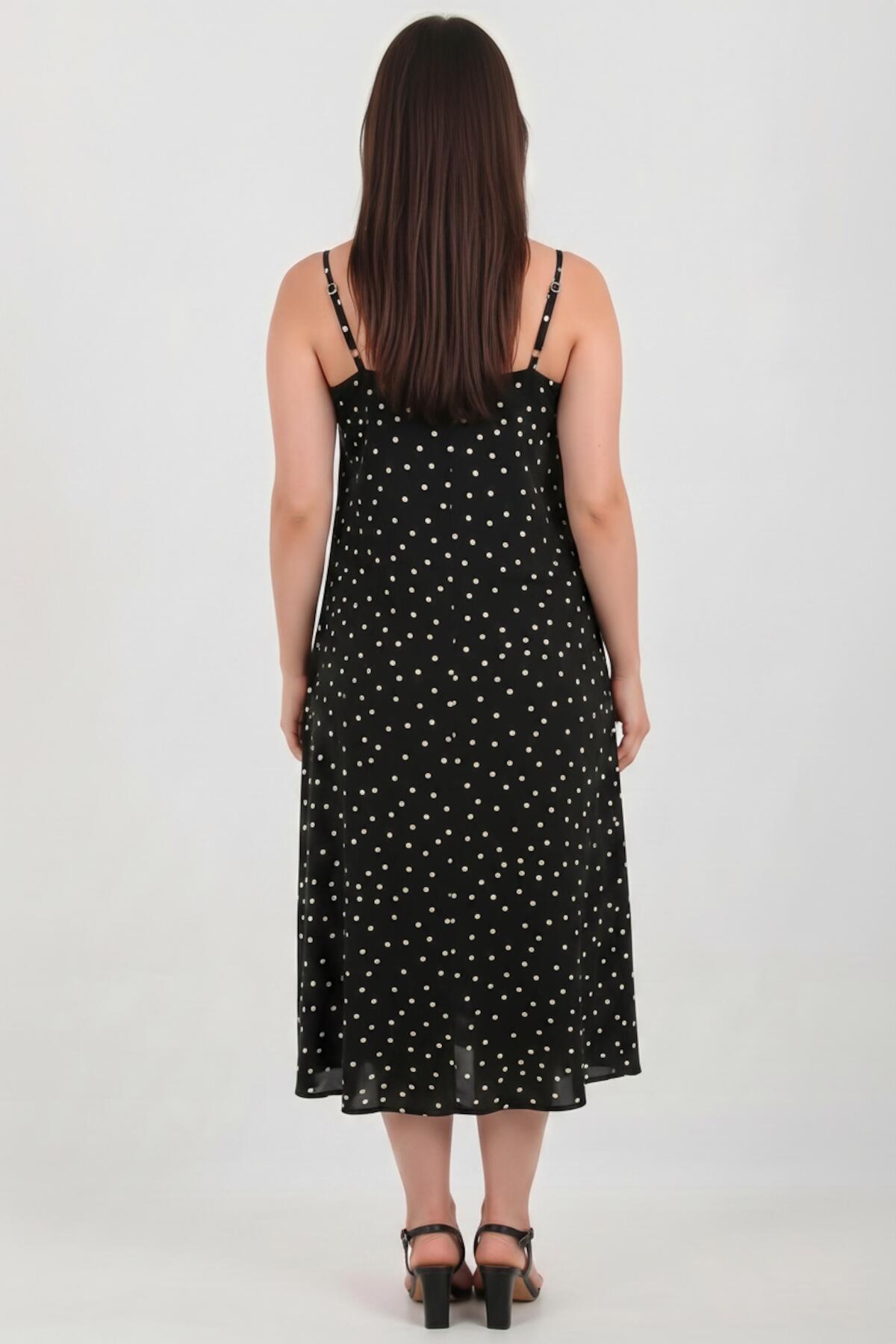 Gepunktetes Kleid mit Bindeträgern — Schwarz