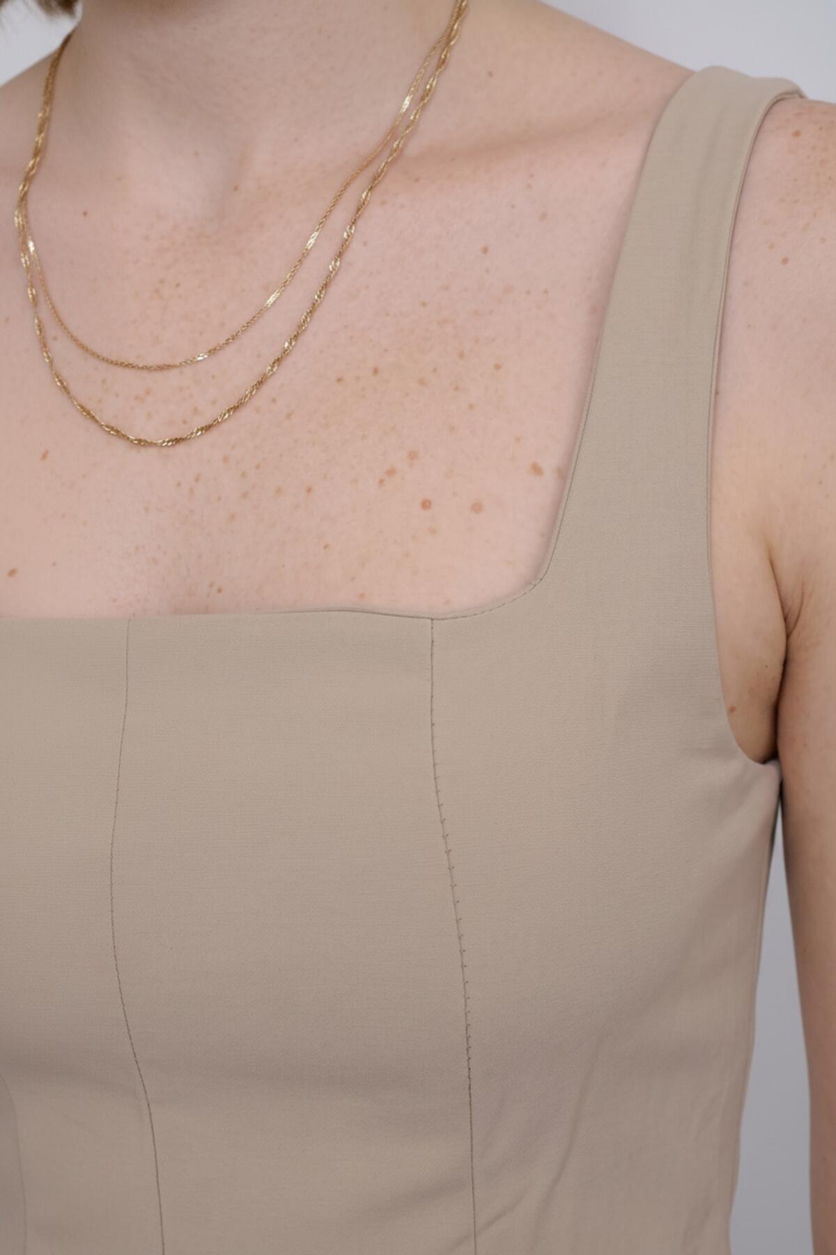 Neckholder-Kleid aus Modal — Creme